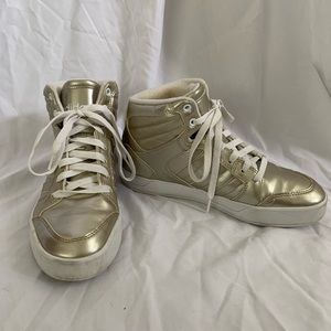 Adidas women’s gold padded high tops Size 7